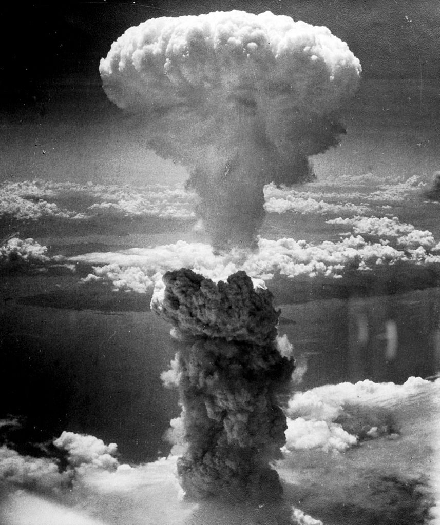 Mushroom cloud above Nagasaki after atomic bombing on August 9, 1945. Taken from the north west. Charles Levy from one of the B-29 Superfortresses used in the attack. (Public Domain via Wikimedia Commons)