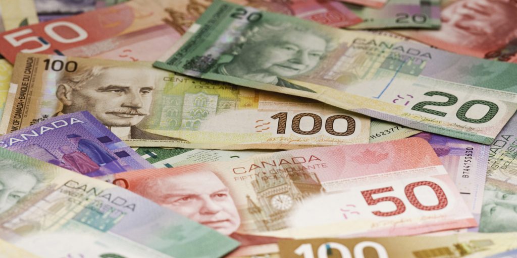 Photo of pile of Canadian bills (money)