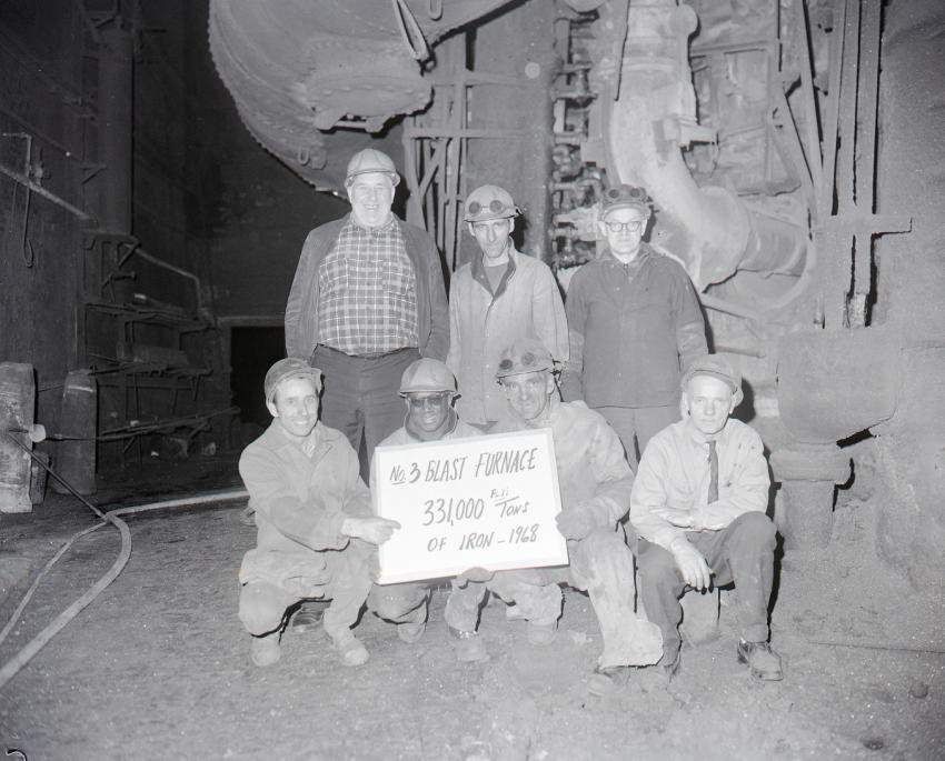 Workers in the blast furnace at SYSCO, 1968, part of Sydney's Coal & Steel cluster. (Photo by John Abbass via the Beaton Institute https://www.cbu.ca/campus/beaton-institute/)