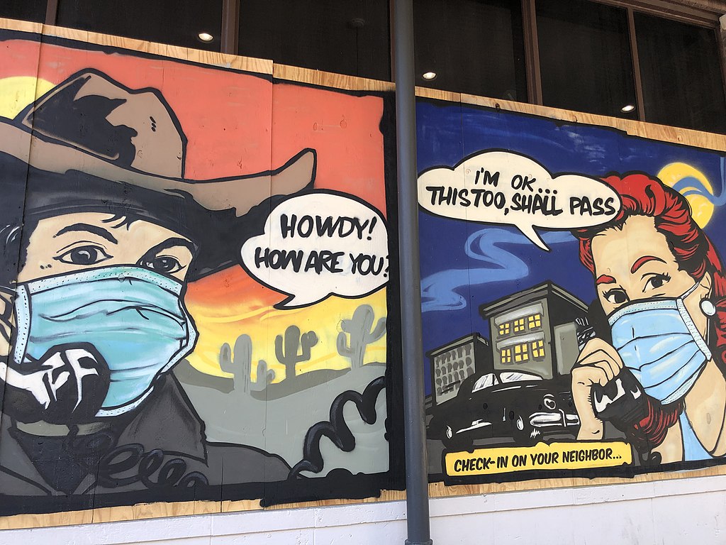 Leah Rodgers / CC BY Coronavirus-related art on boarded-up bar windows, Austin, TX, May 2020. (https://creativecommons.org/licenses/by/4.0)