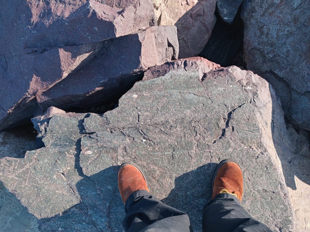 Boots standing on a rock