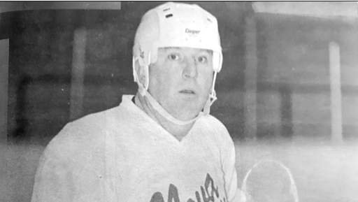 Paul MacEwan in hockey gear, legislative hockey team