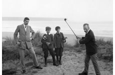 The good old days: Mr Clampett and Mr Downes with their juvenile caddies at Tramore Golf Links, Co. Waterford, 1907. (Source: National Library of Ireland on The Commons, No restrictions, via Wikimedia Commons)