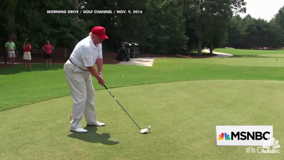 A photo of Donald Trump on a golf course.
